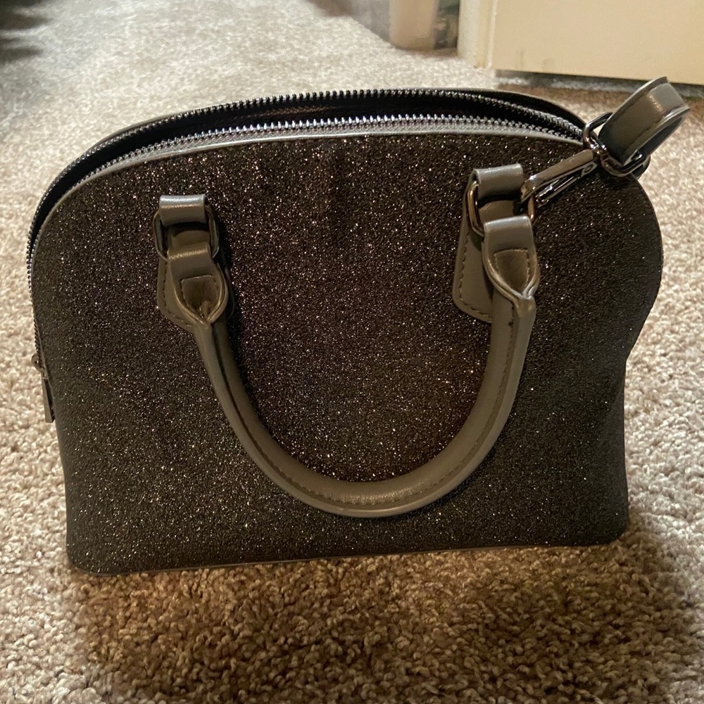 a new day glitter purse